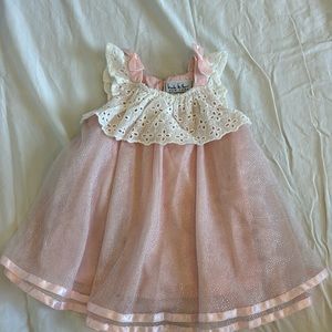 Baby girls first designer dress
